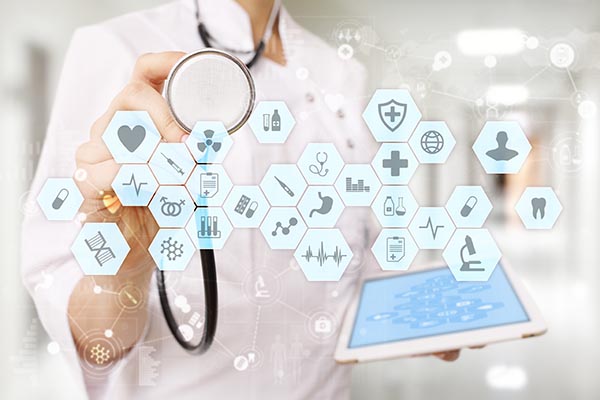 Medical doctor working with modern computer virtual screen interface. Medicine technology and healthcare concept. EMR, EHR, Electronic Health Records.